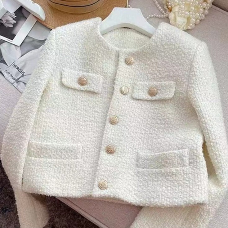 Versatile classic tweed jacket for women, featuring a chic round neck. Ideal outerwear for any occasion.