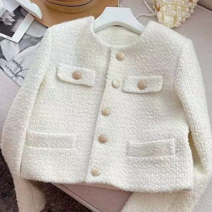 Versatile classic tweed jacket for women, featuring a chic round neck. Ideal outerwear for any occasion.