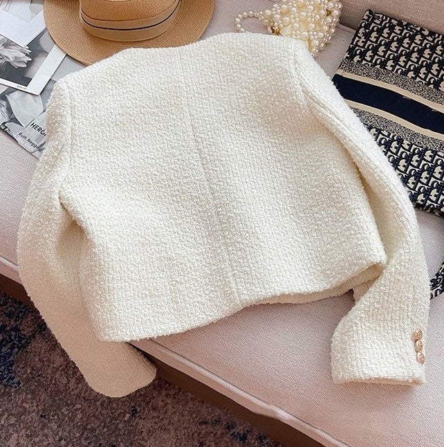 Sophisticated round neck tweed jacket for women, versatile and perfect for elegant ladies' style.
