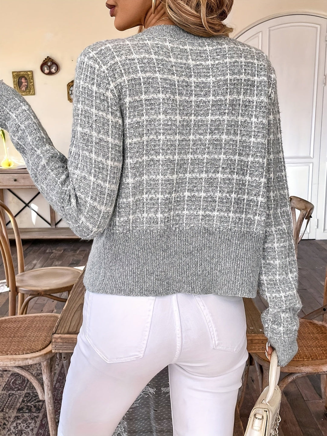 Dressy women's tweed knit button-front cardigan, offering warmth and style for various occasions.