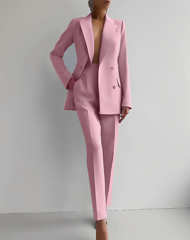 Women's modern tailored blazer and matching pants two-piece set for professional office attire.