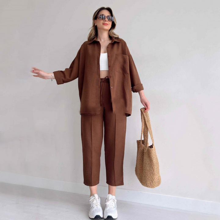 Elegant women's two-piece linen set with long sleeve top & wide leg pants. Perfect for chic summer style.
