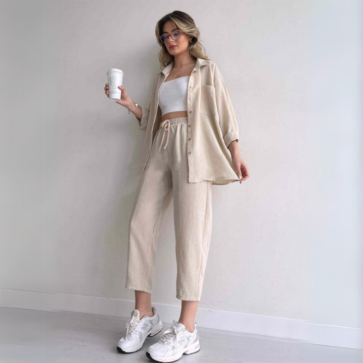 Chic women's lightweight linen set: long sleeve top & wide leg pants. Stylish and comfortable ladies fashion.