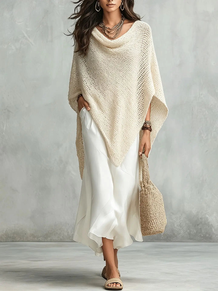 Relaxed fit women's two-piece set featuring an elegant poncho and long maxi dress.