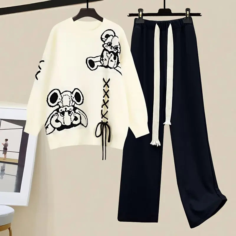 Elegant women's two-piece set: a cozy sweater and chic wide-leg pants. Perfect for fall & winter casual wear.