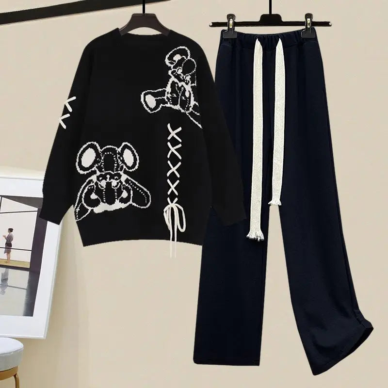 Cozy women's lounge set featuring a soft sweater and comfortable wide-leg pants. Ideal for relaxed fall fashion.