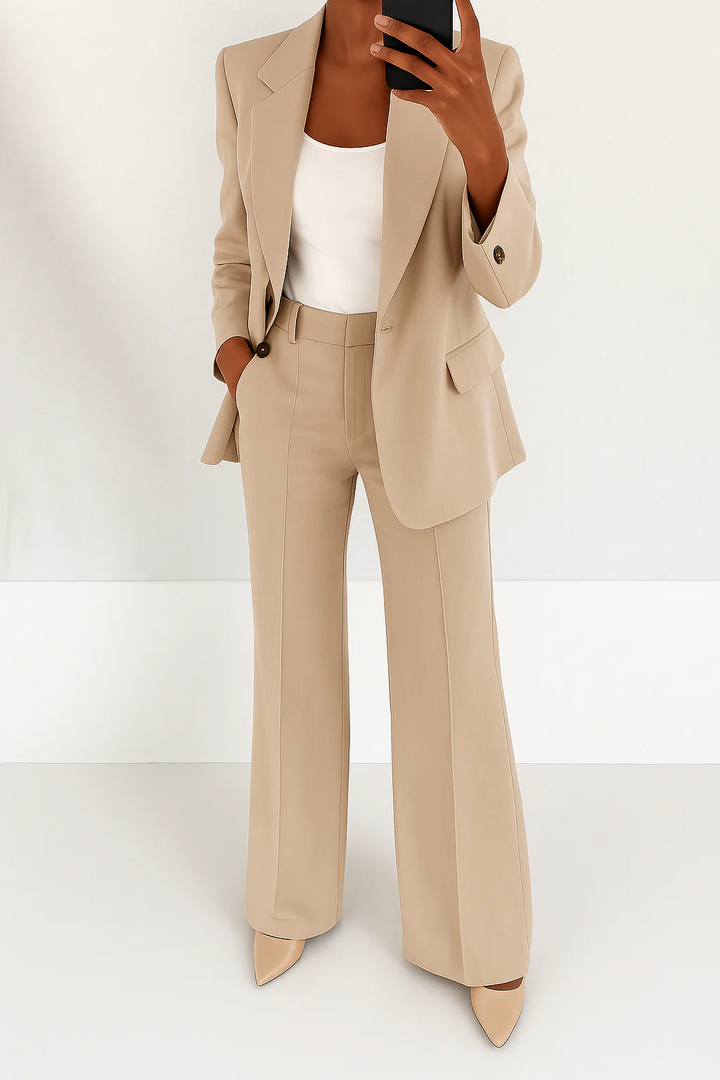 Stylish women's wide-leg pants from an elegant two-piece suit set. Comfortable and chic for business or evening wear.