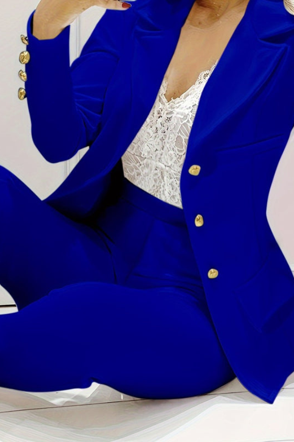 Sophisticated women's two-piece suit. Perfect as business casual or formal wear. Spring style.