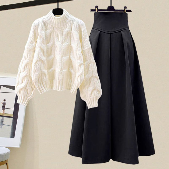 Amira women's long sleeve sweater and pleated skirt set. Stylish and elegant two-piece outfit for any occasion.