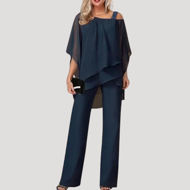 Sophisticated women's two-piece set featuring elegant wide-leg trousers & an asymmetric blouse for formal wear.