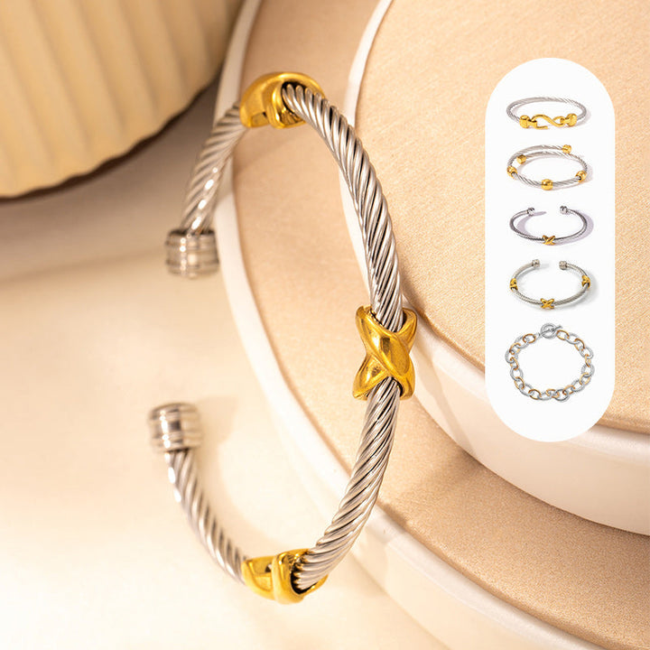 Elegant women's two-tone knot twisted bangle bracelet, perfect for a sophisticated look.