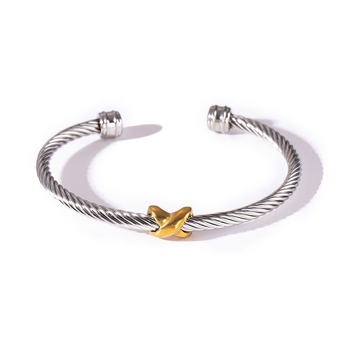 Beautifully crafted women's two-tone knot twisted bangle bracelet, an elegant jewelry piece.