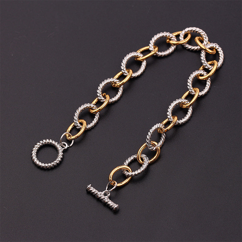 Women's accessory: elegant two-tone knot twisted bangle bracelet, high-quality stainless steel.