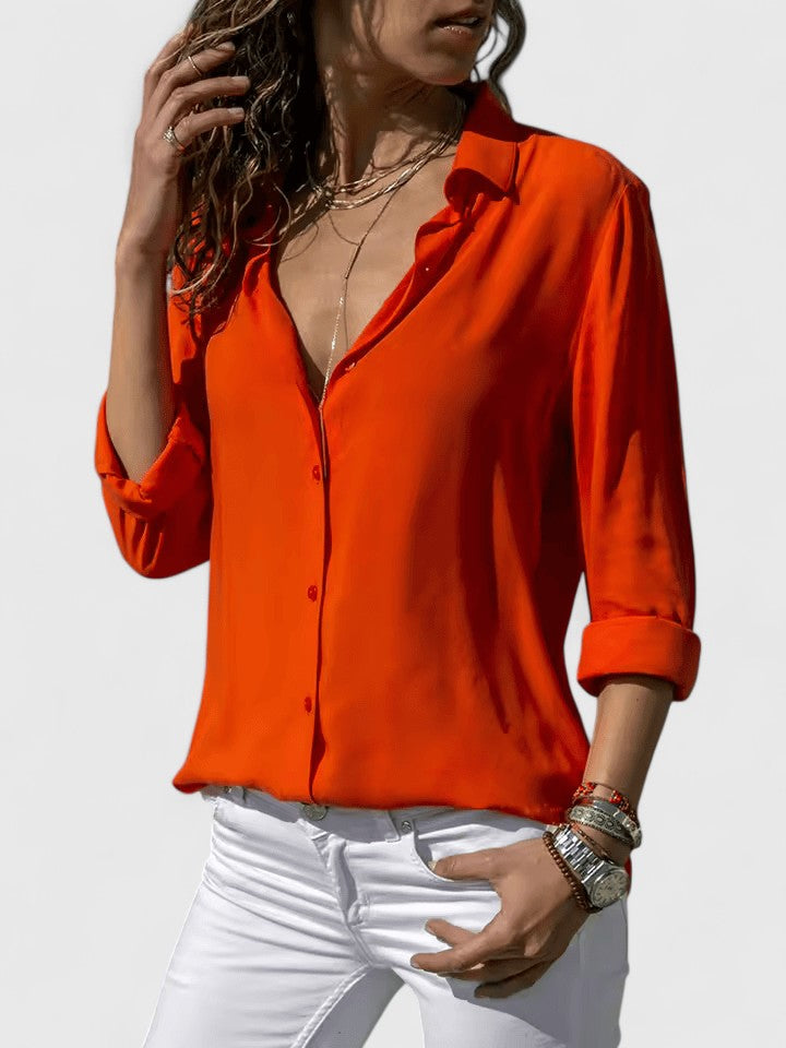 Chic women's V-neck blouse, an elegant and comfortable top with a relaxed fit for various occasions and seasons.