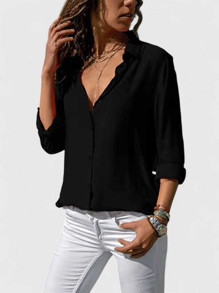 Professional women's V-neck blouse, an elegant workwear top designed for comfort and sophisticated office fashion.