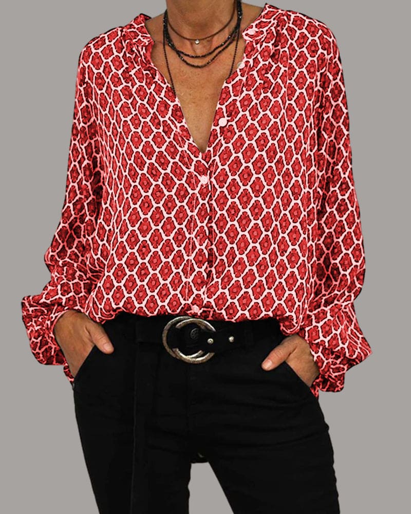 Versatile V-neck blouse for women. Elegant long sleeve top, ideal for casual, formal, or everyday wear.