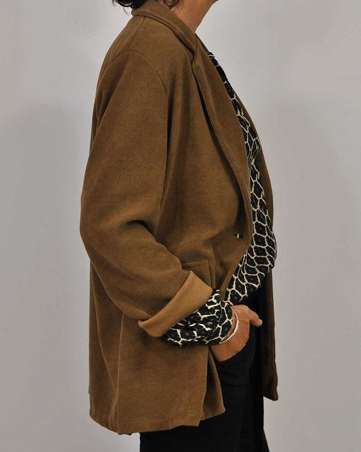 Stylish women's V-neck long sleeve blouse. Comfortable & chic, a perfect wardrobe staple for any occasion.