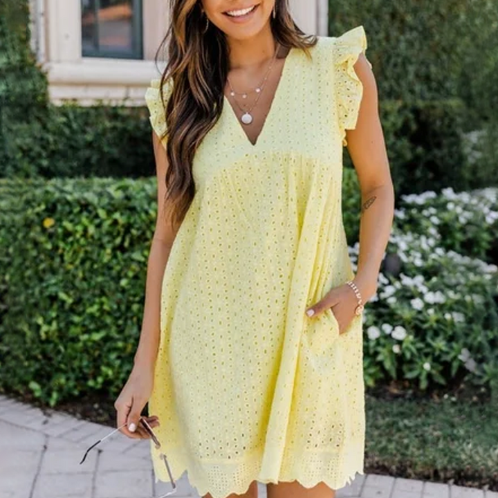 Stylish elegant V-neck lace hollow dress for women, offering a comfortable A-line fit