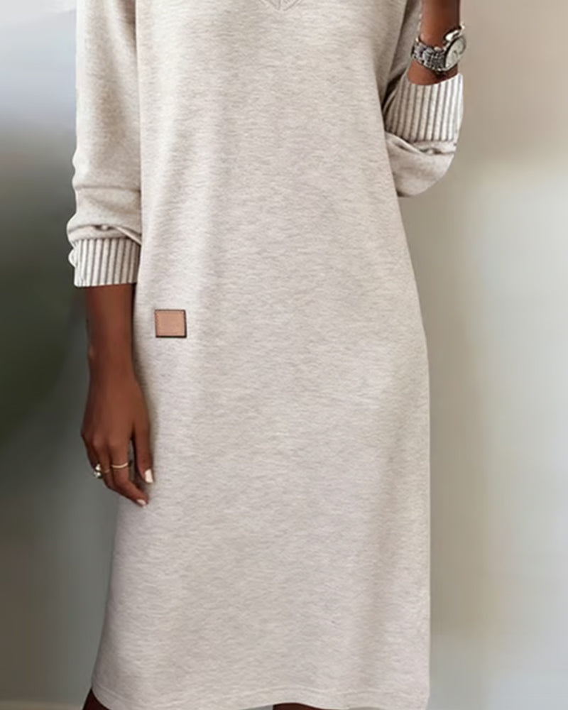 Women's V-neck long sleeve midi dress in a flattering silhouette, ideal for office, work, or casual elegance.