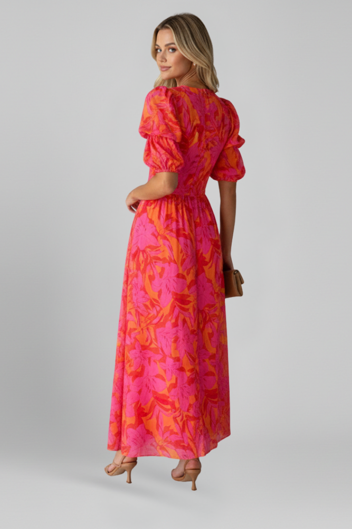 Elegant long women's V-neck maxi dress, featuring graceful puff sleeves. A versatile comfortable dress for any occasion.