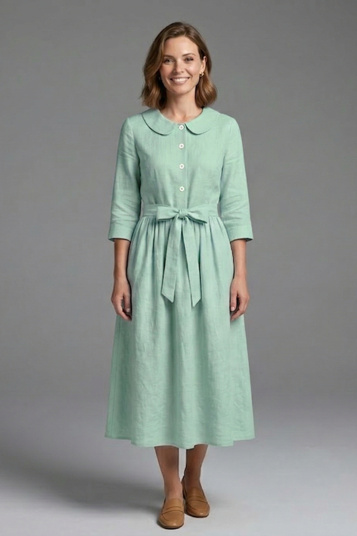 Sophisticated women's V-neck midi dress with a versatile waist tie, a must-have wardrobe essential.