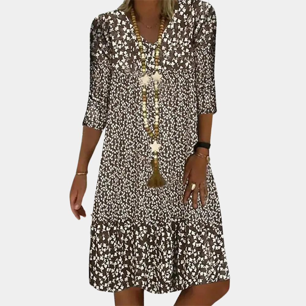 Comfortable & versatile women's V-neck midi summer dress. Ideal for everyday wear, offering an elegant casual look.