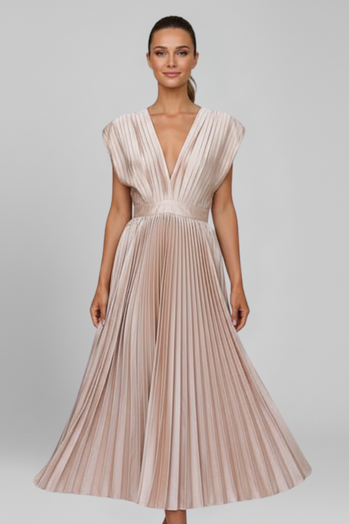 Close-up of the elegant V-neckline on a women's pleated midi dress, perfect for a refined look.