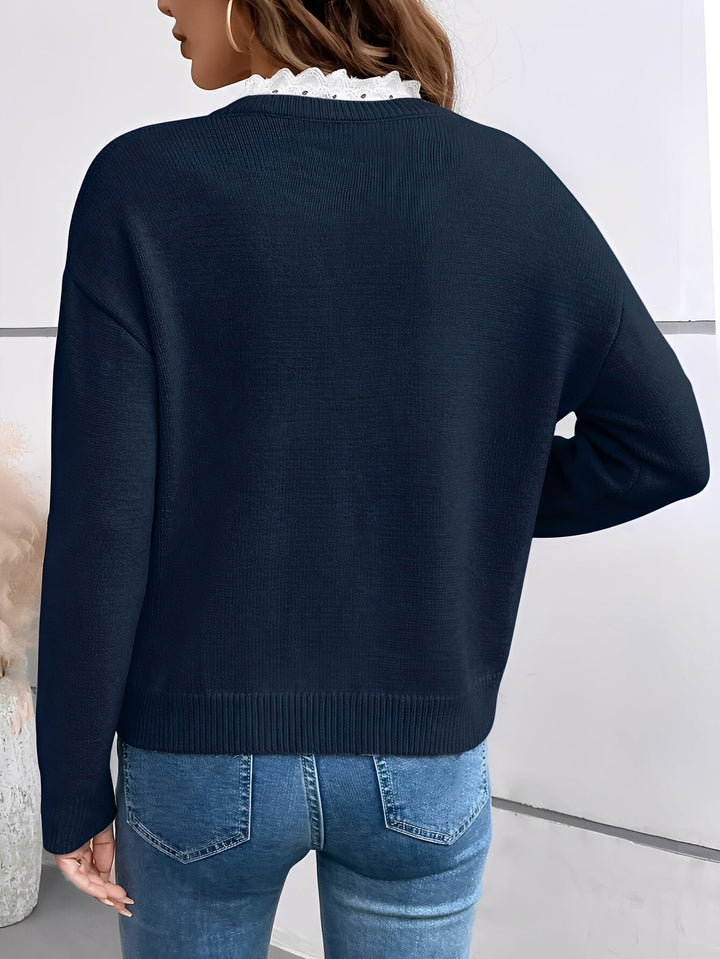 Stylish women's lace-trim V-neck pullover, great for office wear or smart casual autumn outfits. Cozy & fashionable.