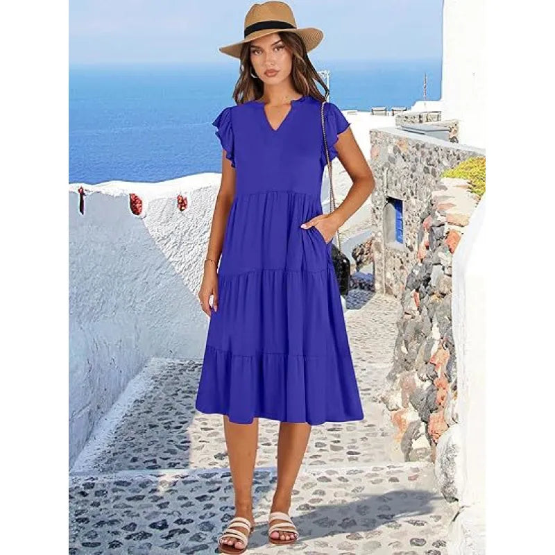 Elegant women's V-neck tiered midi dress with flutter sleeves, ideal for summer casual or party wear.