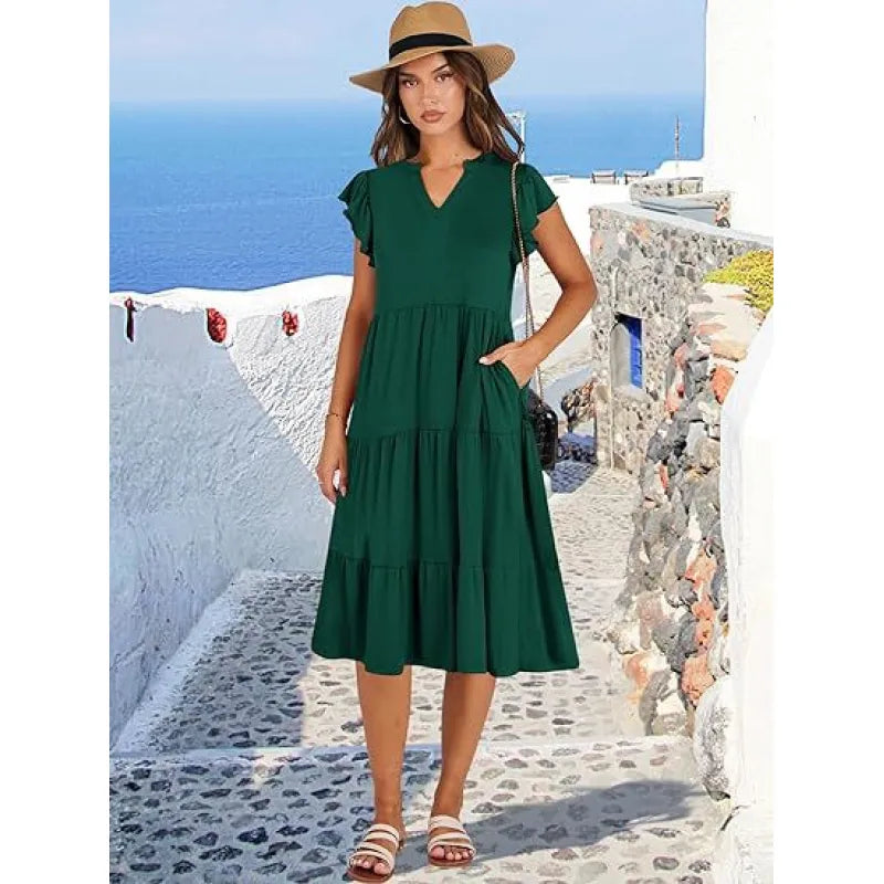 Versatile women's V-neck tiered midi dress with flutter sleeves. Easy-to-style for casual, work or party wear.