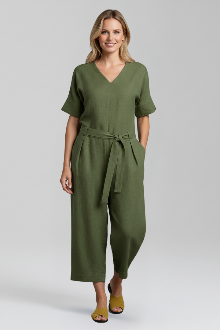 Fashionable women's long-sleeve V-neck wide-leg jumpsuit featuring an elegant waist tie and modern style.