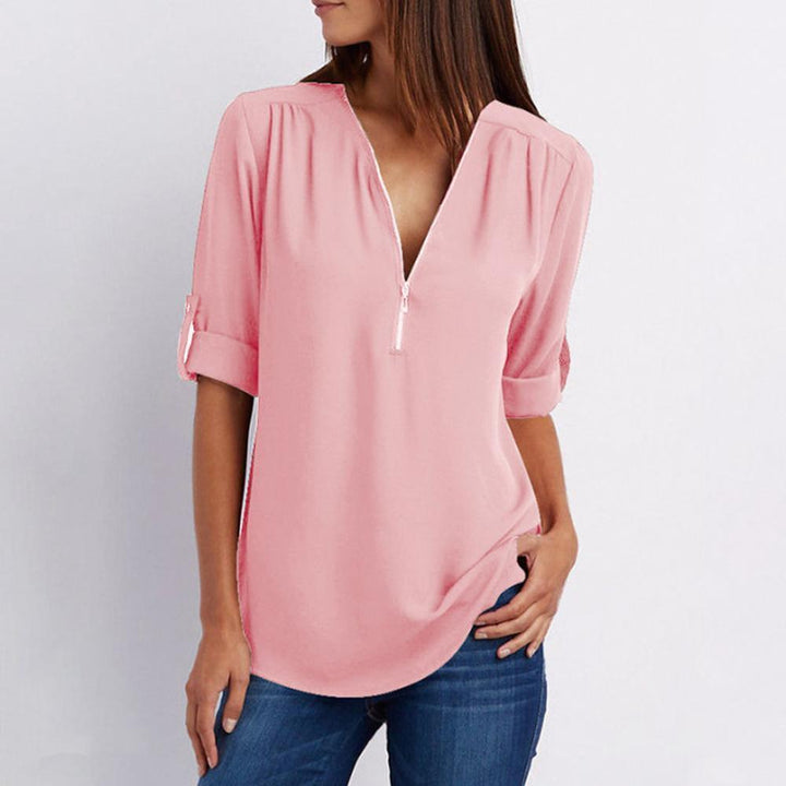 Casual women's chiffon blouse featuring a V-neck, zipper detail, and unique patchwork sleeves