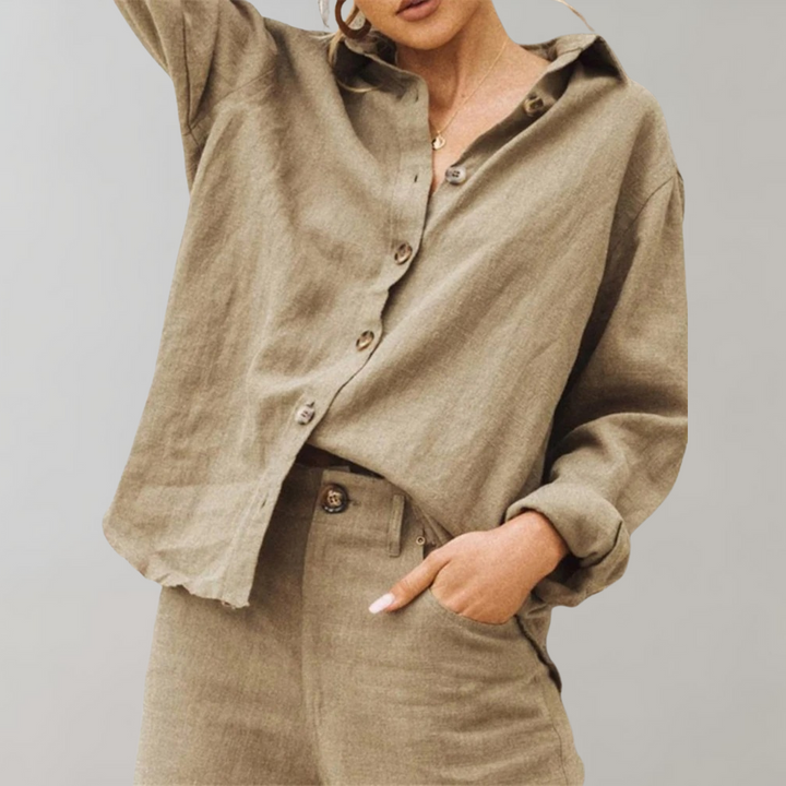 Chic button-down blouse, a versatile women's vintage top with elegant style for casual or dressy wear.