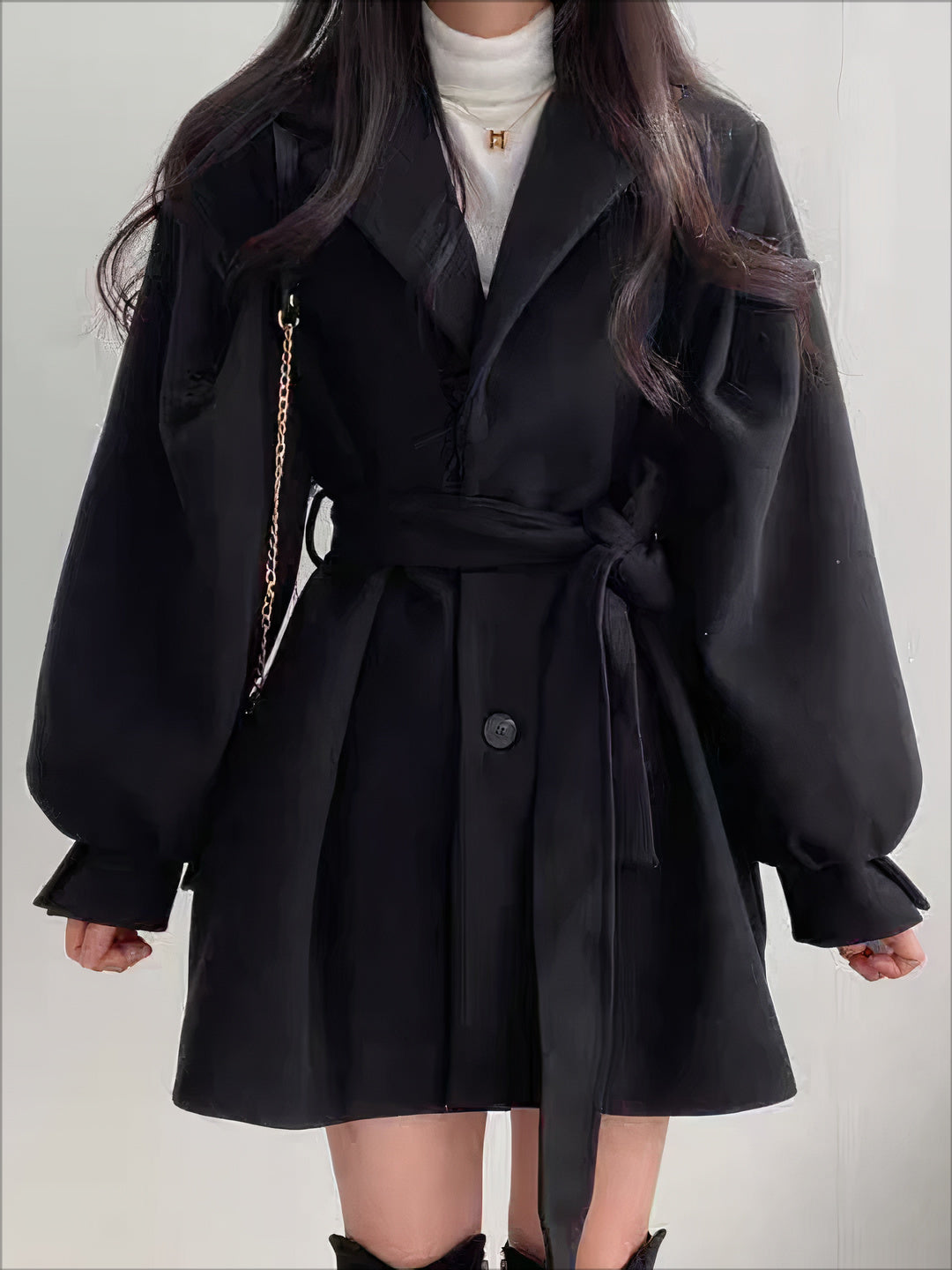 Stylish women's long belted winter coat. Elegant wool jacket, perfect for cold weather and versatile ladies fashion.