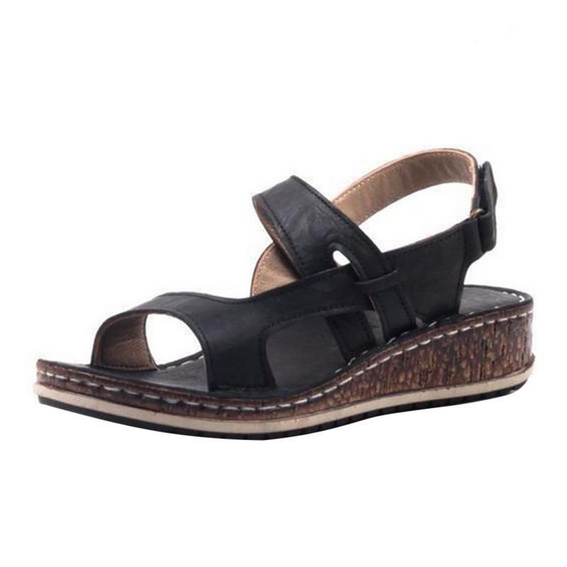 Comfortable elegant wedge sandals for women, perfect summer footwear. Chic open-toe design.