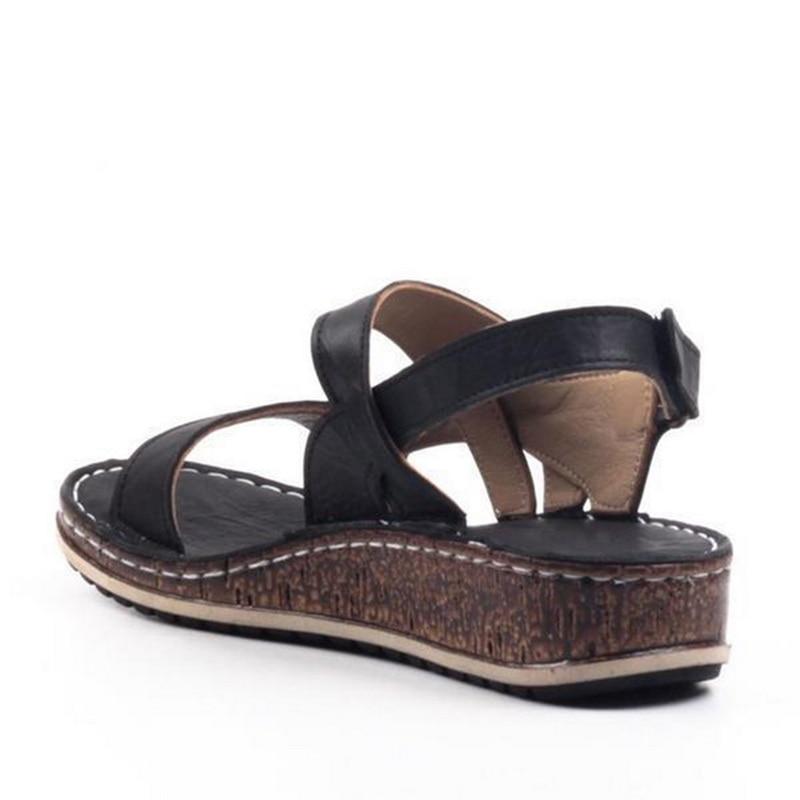 Women's fashion wedge sandals, elegant and comfortable for summer. Chic open-toe footwear.