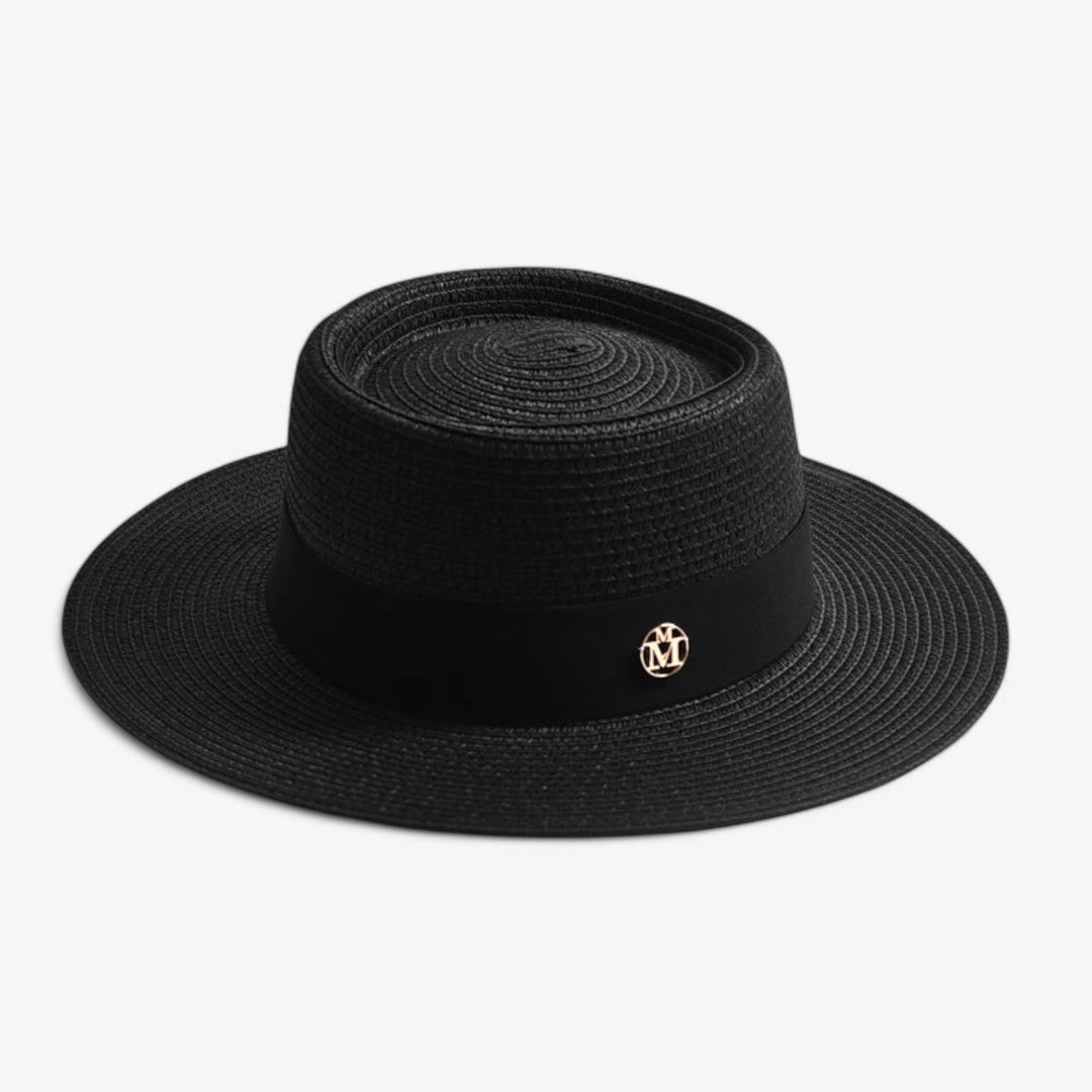 Elegant straw wide brim hat for women, offering superior UV protection as a chic accessory.