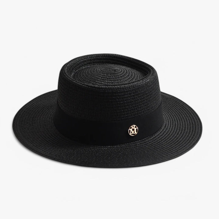Elegant straw wide brim hat for women, offering superior UV protection as a chic accessory.