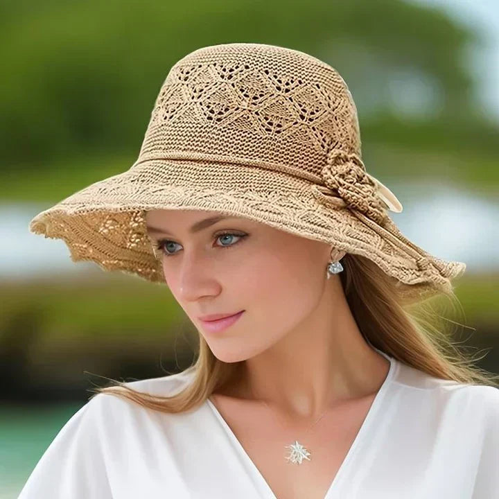 Fashionable women's sun hat with an elegant wide brim for summer, beach & outdoor adventures.