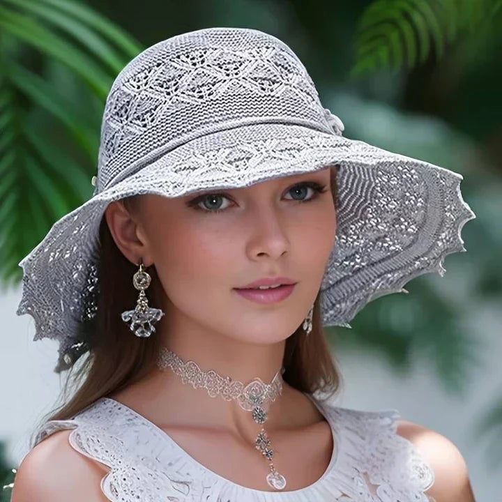Chic women's wide-brim sun hat. A must-have for summer vacations, travel & stylish sun shielding.