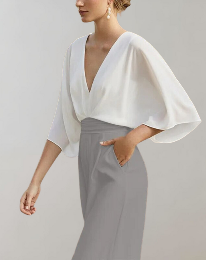 Luxurious fabric of women's elegant wide leg jumpsuit. Sophisticated evening wear, ideal for formal events.