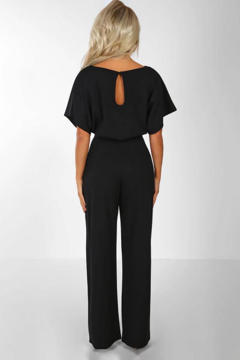 Versatile women's wide-leg jumpsuit with elegant batwing sleeves & belt. Ideal for stylish day or evening wear.