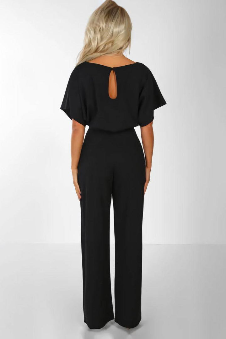 Versatile women's wide-leg jumpsuit with elegant batwing sleeves & belt. Ideal for stylish day or evening wear.