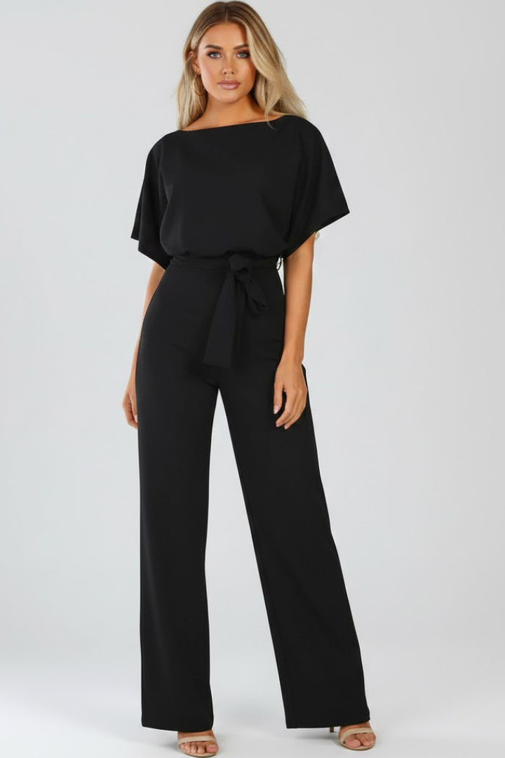 Versatile women's full-length jumpsuit, wide-leg style, short sleeve & tie waist detail. Effortless fashion.