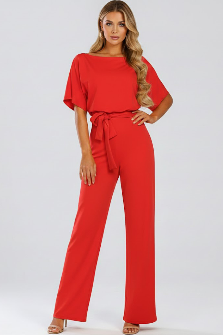 Womens one-piece wide-leg jumpsuit, casual & elegant, with a flattering tie waist, round neck & short sleeves.