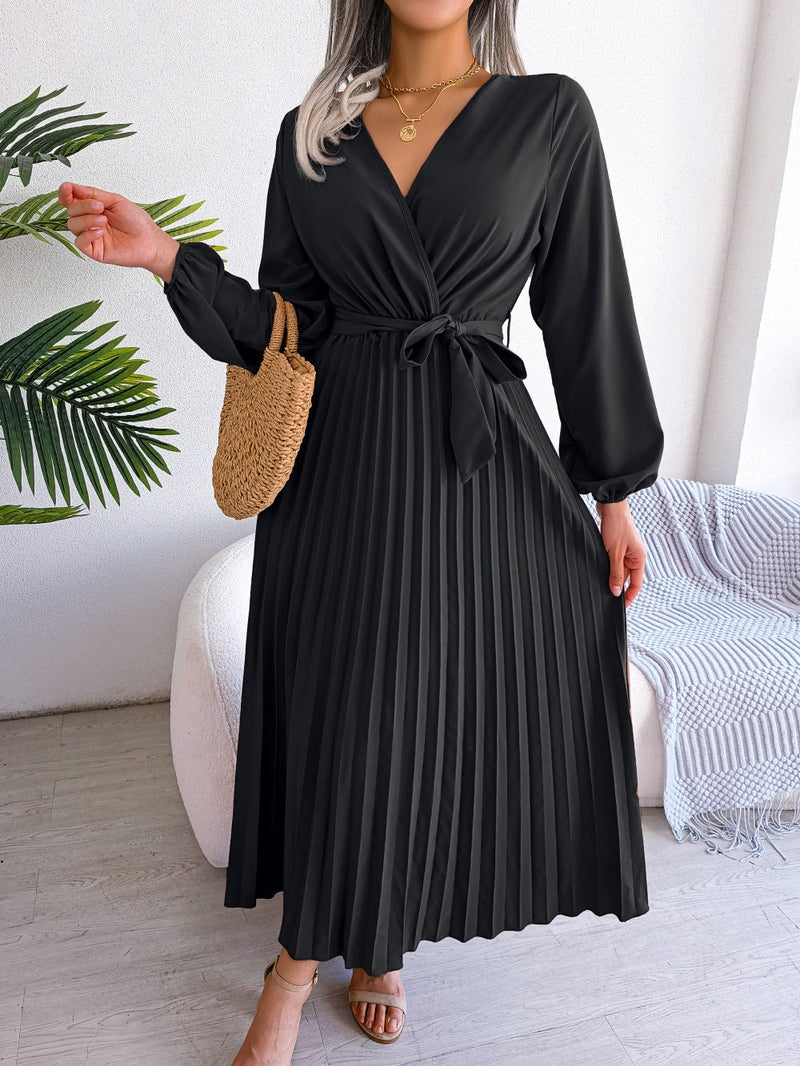 Stylish women's maxi dress featuring delicate lotus sleeves and a flattering V-neck, ideal for evening wear.