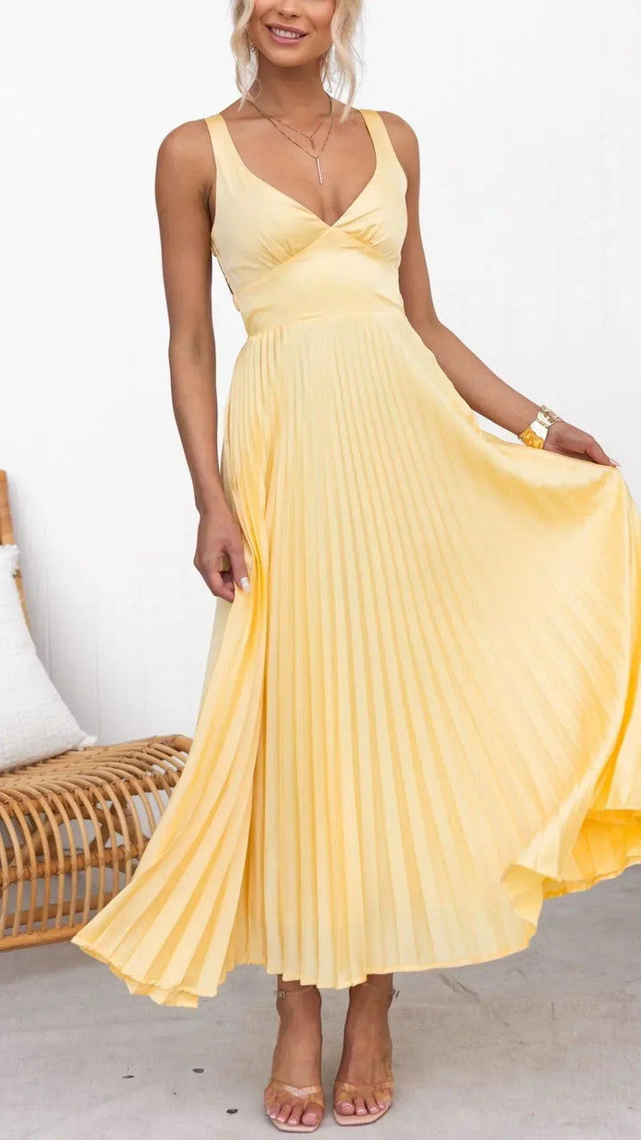 Elegant women's yellow pleated V-neck maxi dress, perfect for summer occasions