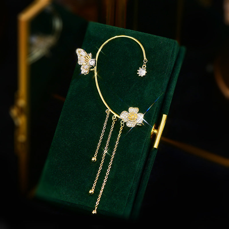 Exquisite women's dangle earrings, prominent zircon butterflies with flowing tassel details.