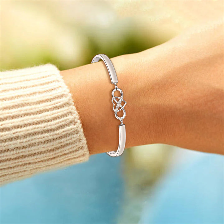 Sterling silver heart charm bracelet, engraved 'Mom', women's jewelry accessory.