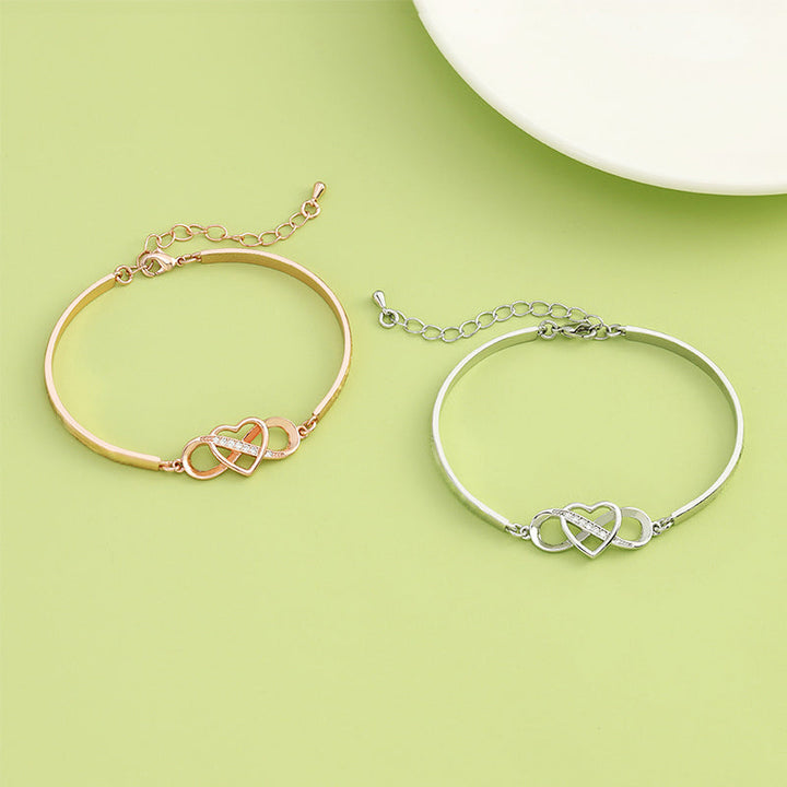 Elegant rose gold engraved heart bracelet for Mom, a beautiful accessory.